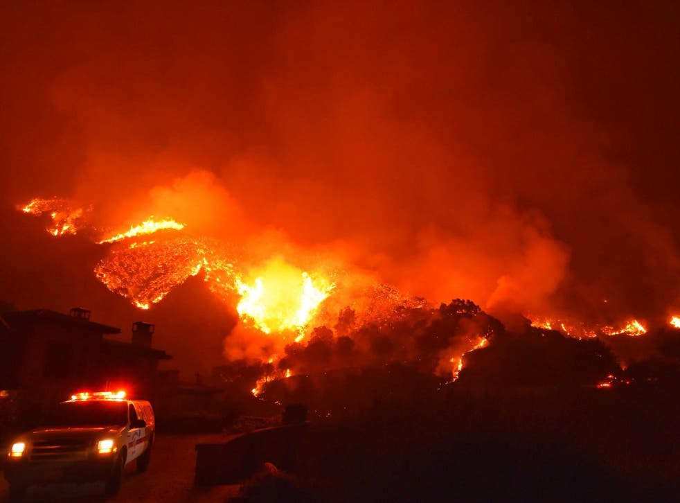 The Thomas wildfire burns above Bella Vista Drive near Romero Canyon in Montecito, California