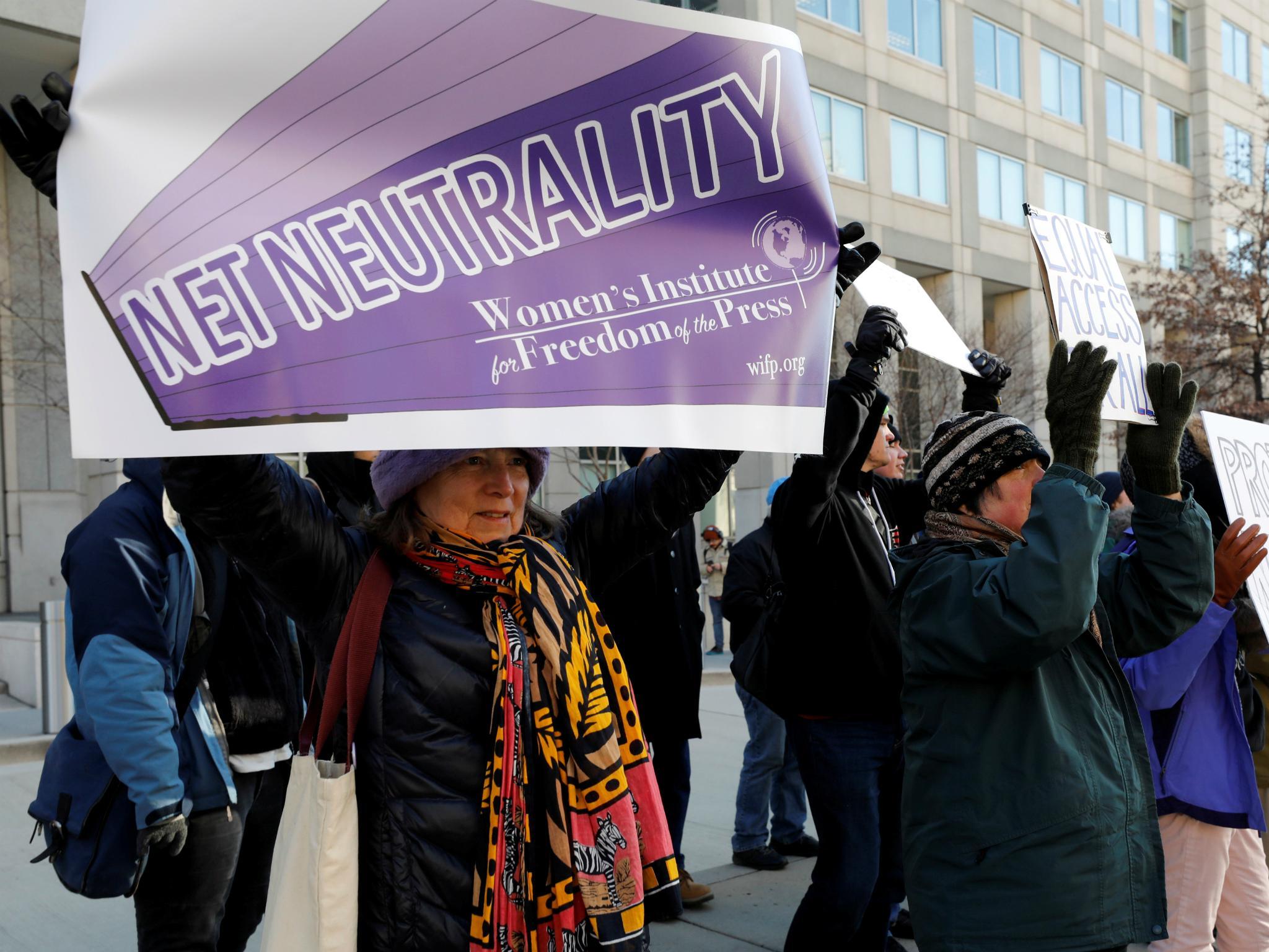 Net neutrality advocates rally in front of the Federal Communications Commission (FCC) ahead of Thursday's expected FCC vote repealing so-called net neutrality rules in Washington, U.S., December 13, 2017