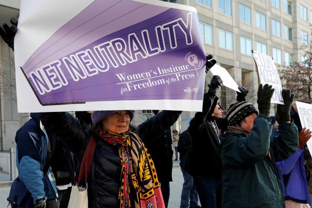 Net neutrality advocates rally in front of the Federal Communications Commission (FCC) ahead of Thursday's expected FCC vote repealing so-called net neutrality rules in Washington, U.S., December 13, 2017