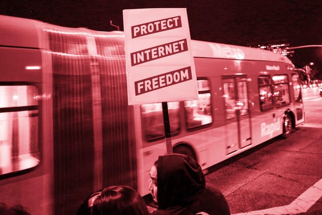 Supporter of Net Neutrality Lance Brown Eyes protests the FCC's recent decision to repeal the program in Los Angeles, California, November 28, 2017