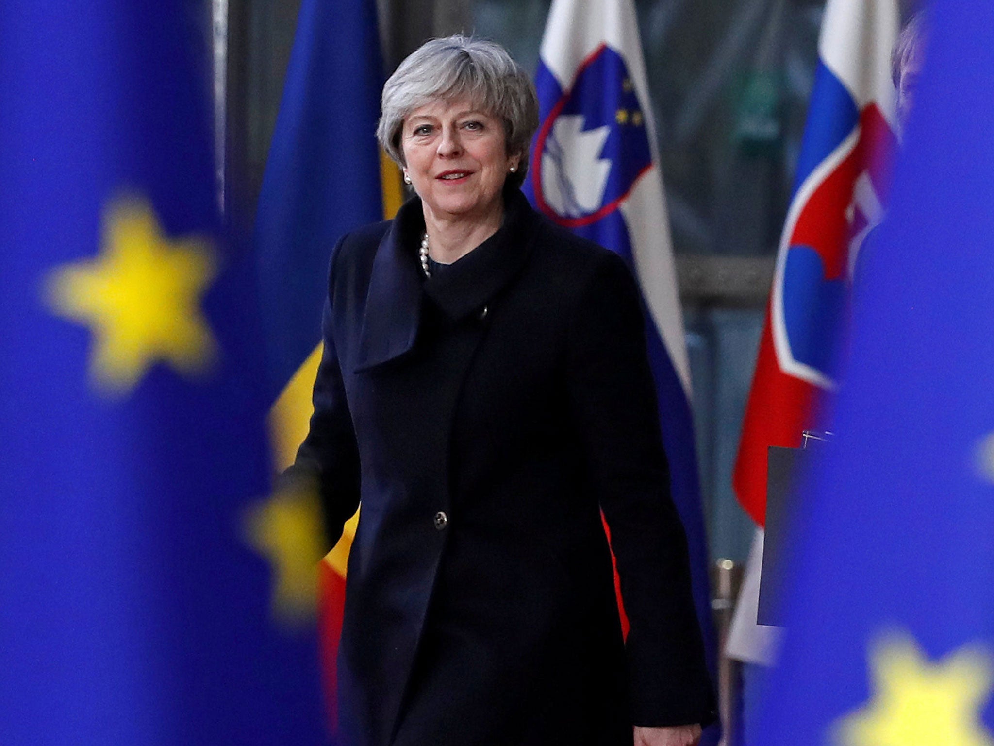 Theresa May arrives for the European Union summit in Brussels