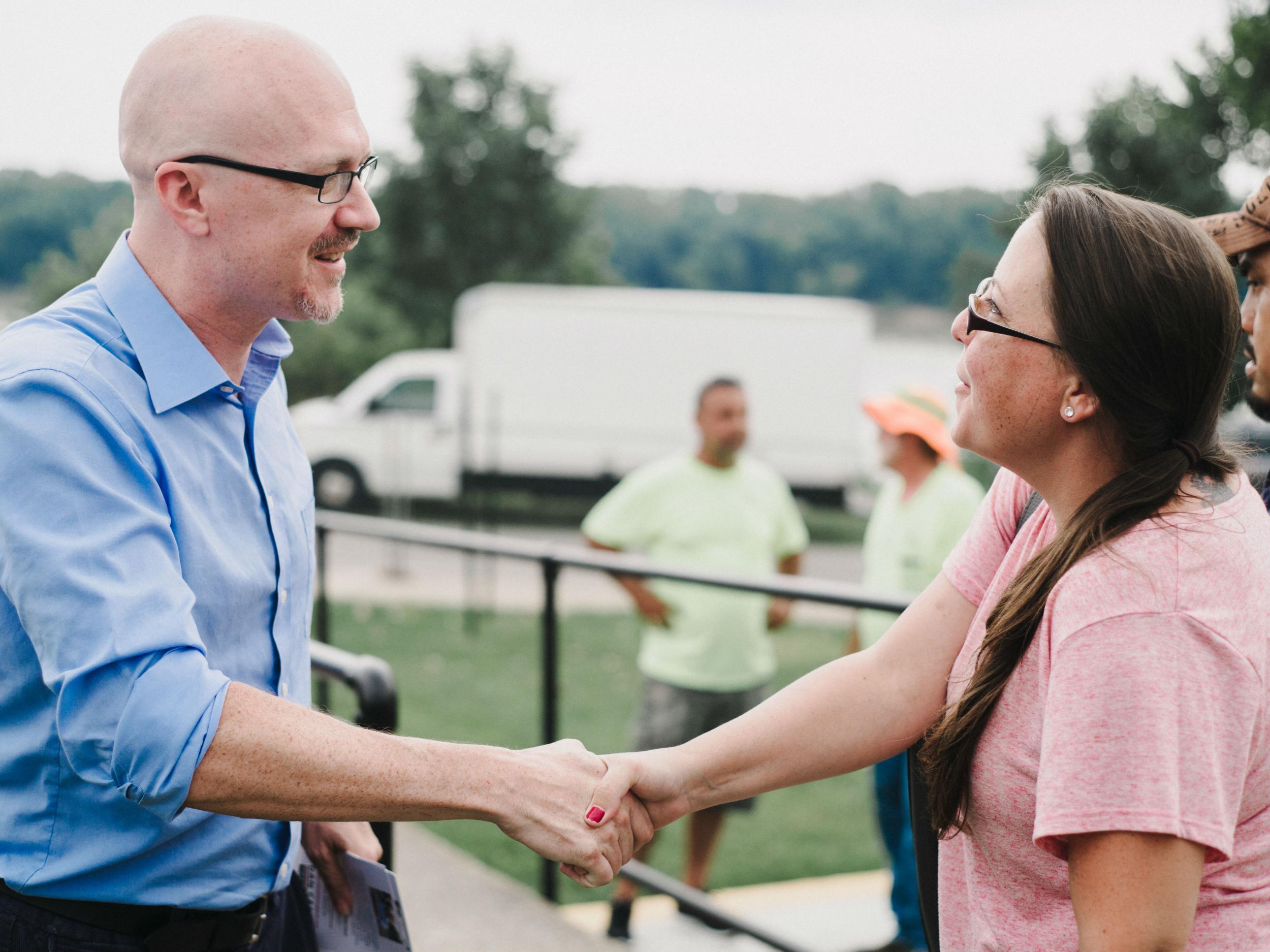 Mr Canon meets with a supporter on the campaign trail