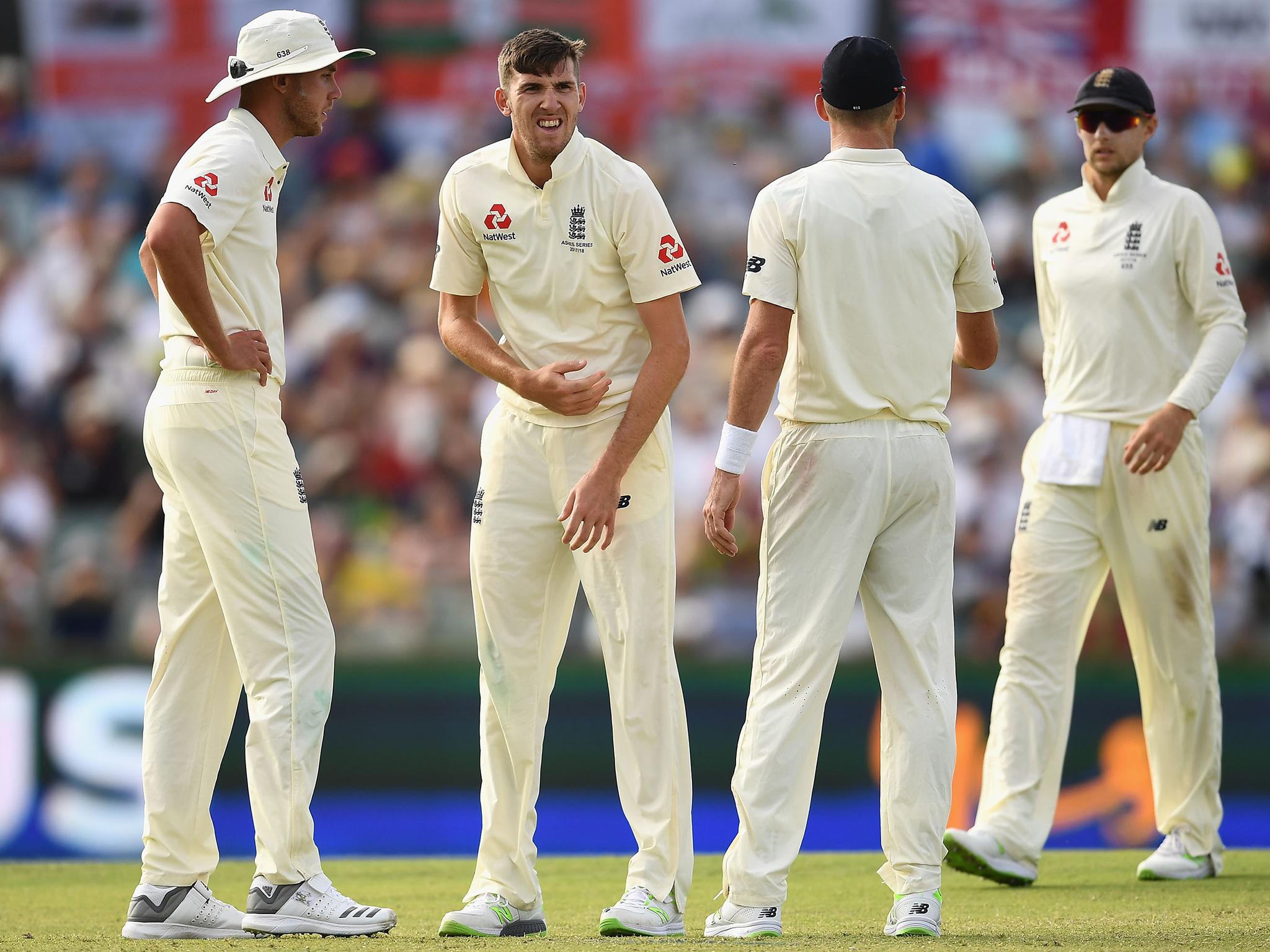 Craig Overton grimaces after suffering a broken rib in the third Test against Australia