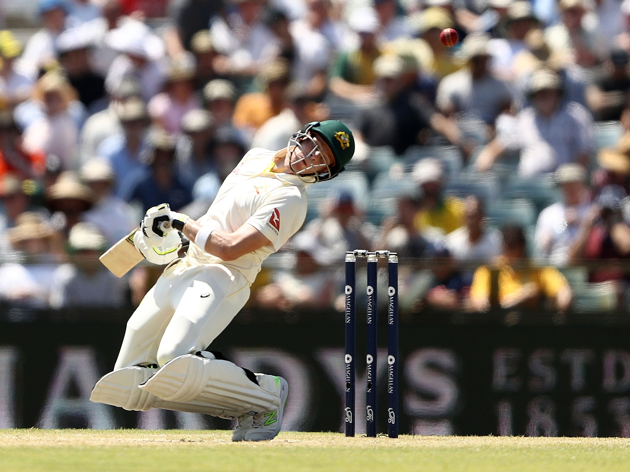 Steve Smith ducks out of the way of a bouncer on his way to 229 not-out on day three