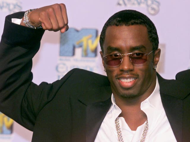 US Rap star Puff Daddy poses for the photographers during the 1999 MTV Europe Music Awards, at the Point in Dublin 11 November 1999. Credit: JOEL SAGET/AFP/Getty Images.