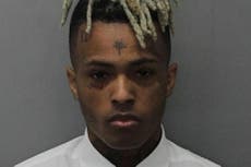 Video shows controversial rapper XXXtentacion hitting woman's head