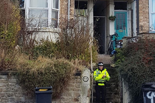 Police stand outside a property in the Meersbrook area of Sheffield as four men have been arrested on suspicion plotting terror attacks