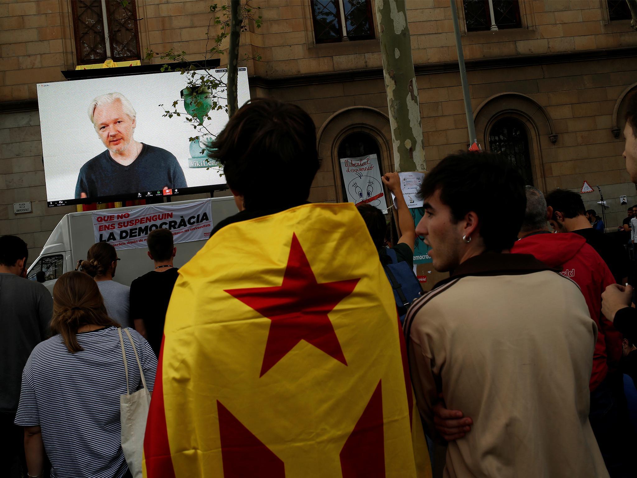 Wikileaks founder Julian Assange on a screen in Barcelona