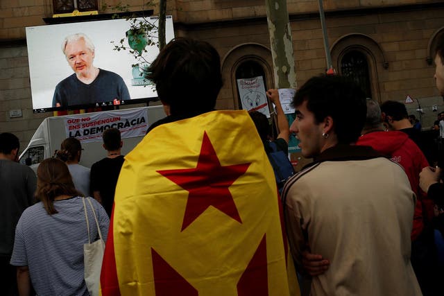 Wikileaks founder Julian Assange on a screen in Barcelona