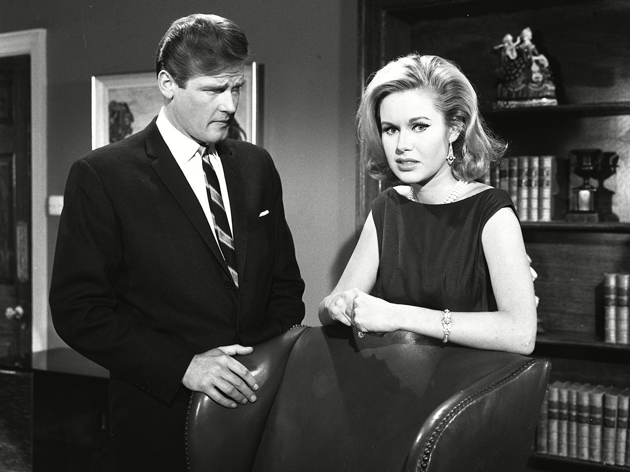 Leigh with Roger Moore in TV's ‘The Saint’ (Rex)