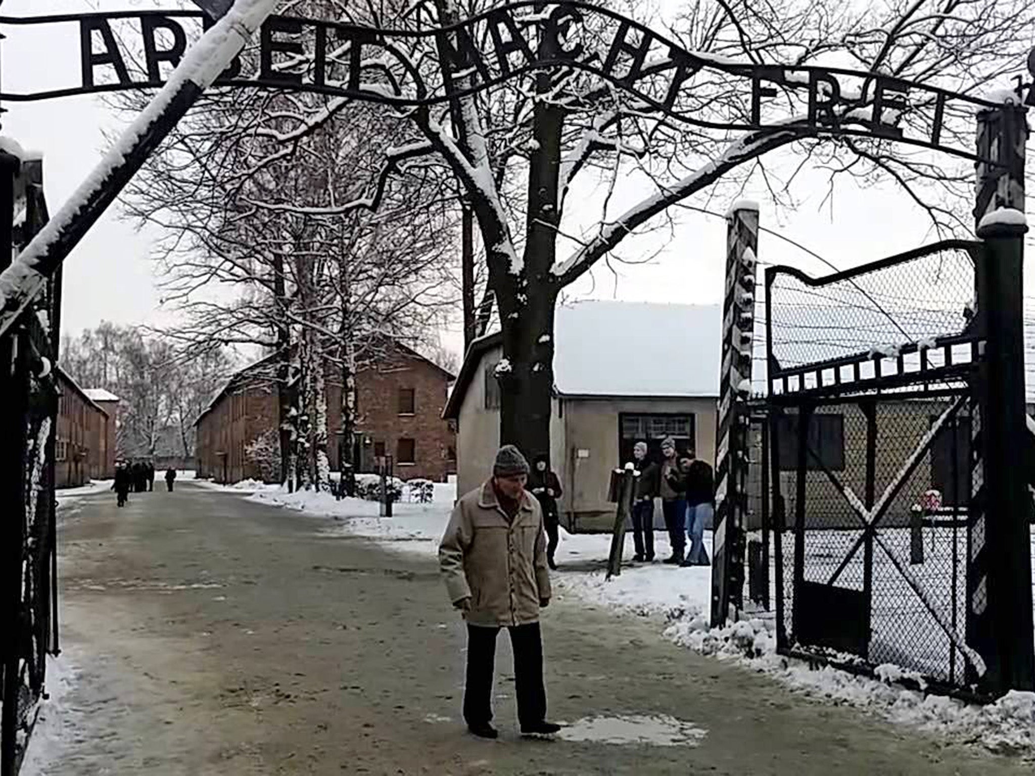 Kazimierz Piechowski visiting Auschwitz