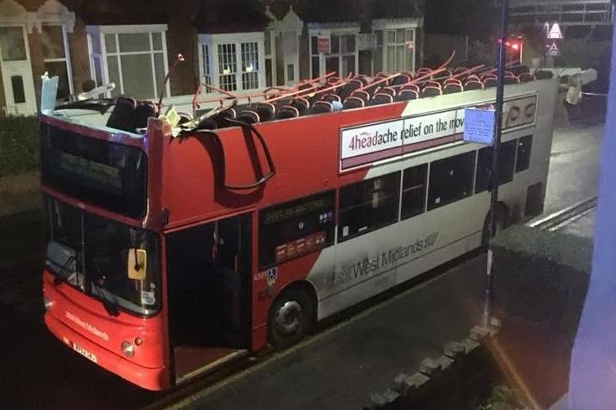 Roof of doubledecker bus ripped off after it crashes into low bridge