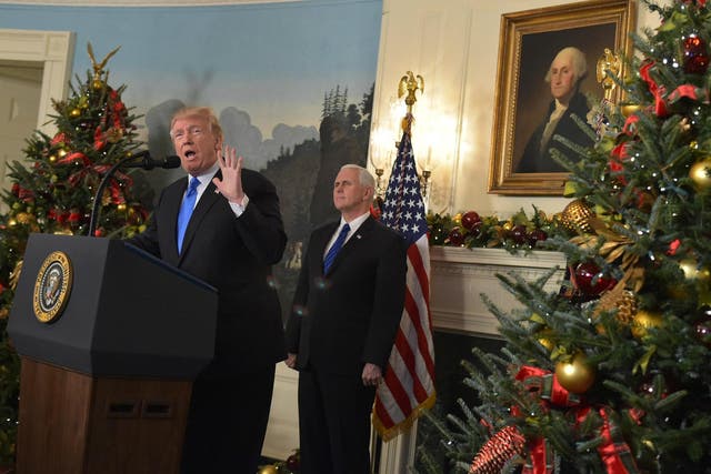 President Donald Trump says 'we can say Merry Christmas again'