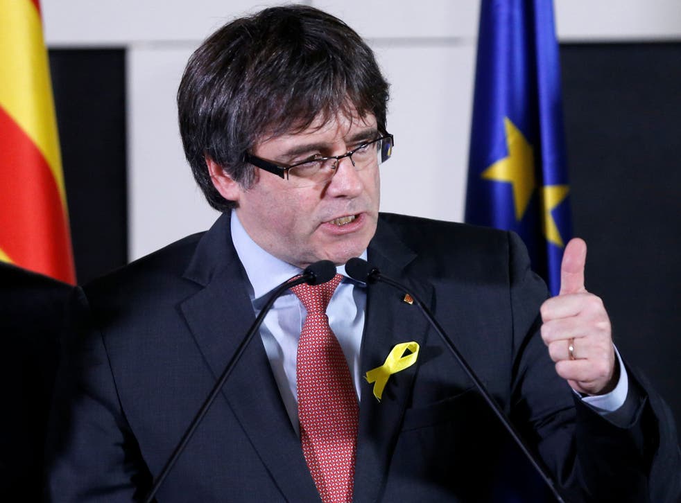 Carles Puigdemont addresses the media after watching the results of Catalonia's regional election in Brussels