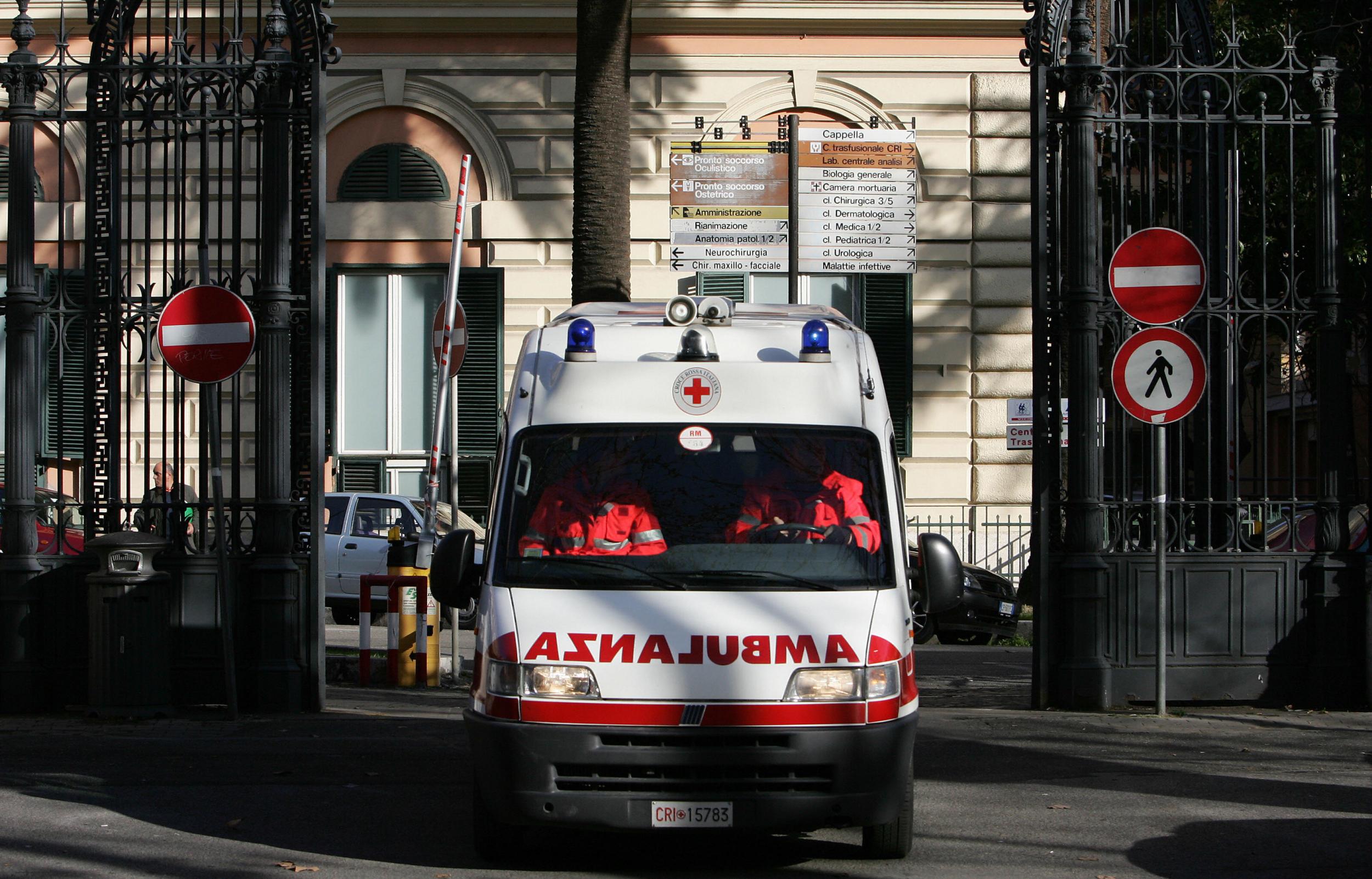 An ambulance exits Rome's Policlinico Umberto I hospita