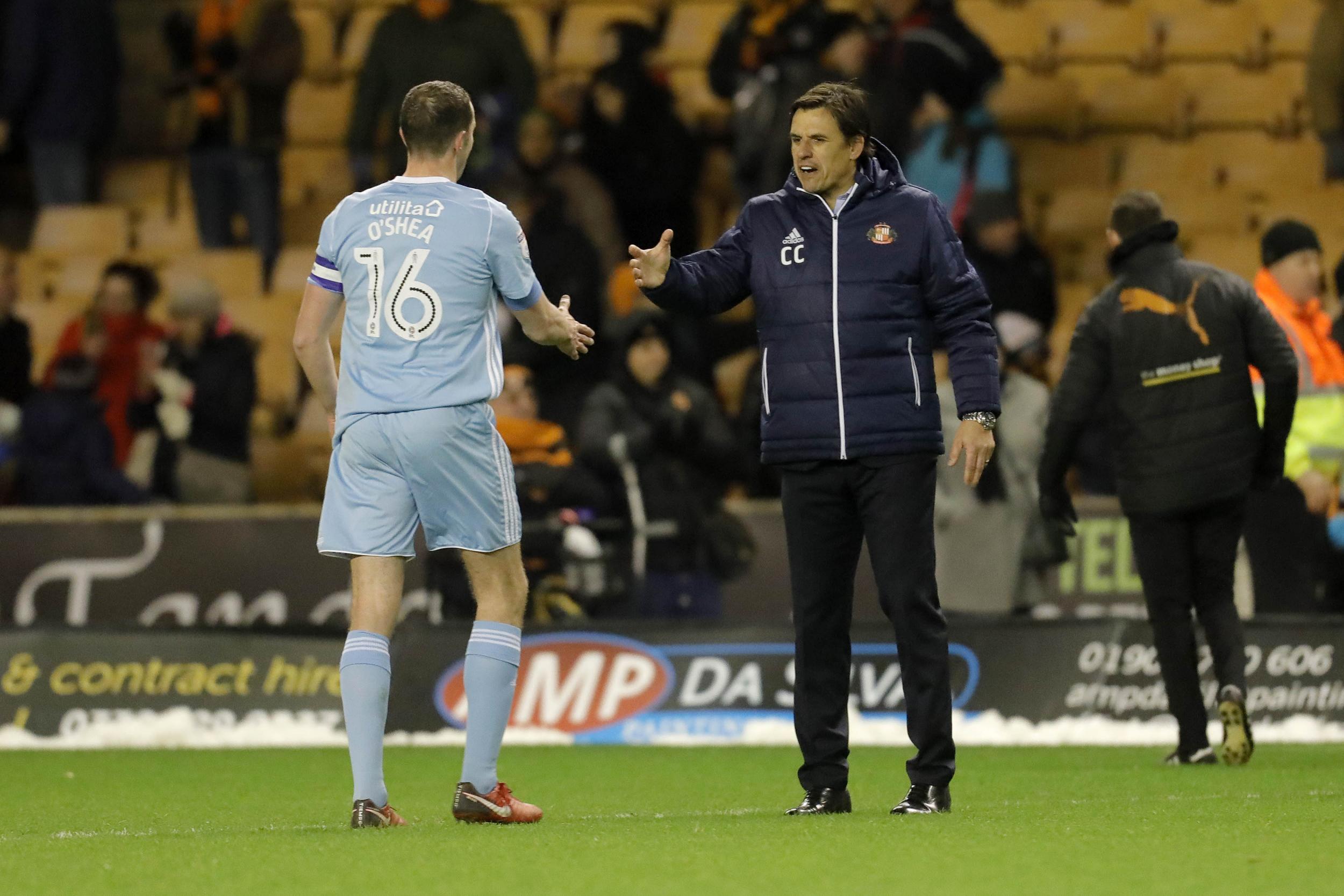 Coleman congratulates John O'Shea after the draw with Wolves