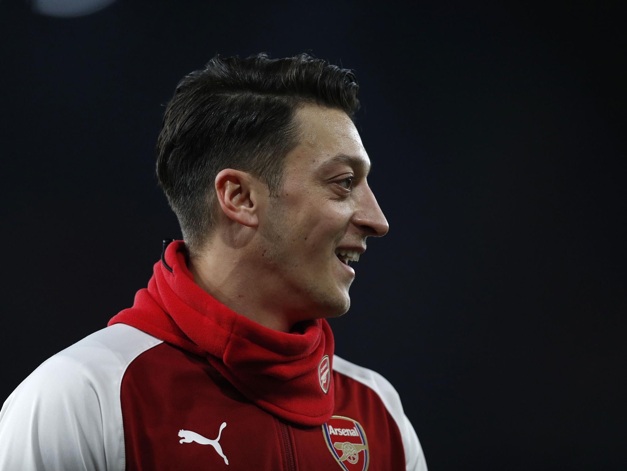 Mesut Ozil said he was proud to play for Arsenal