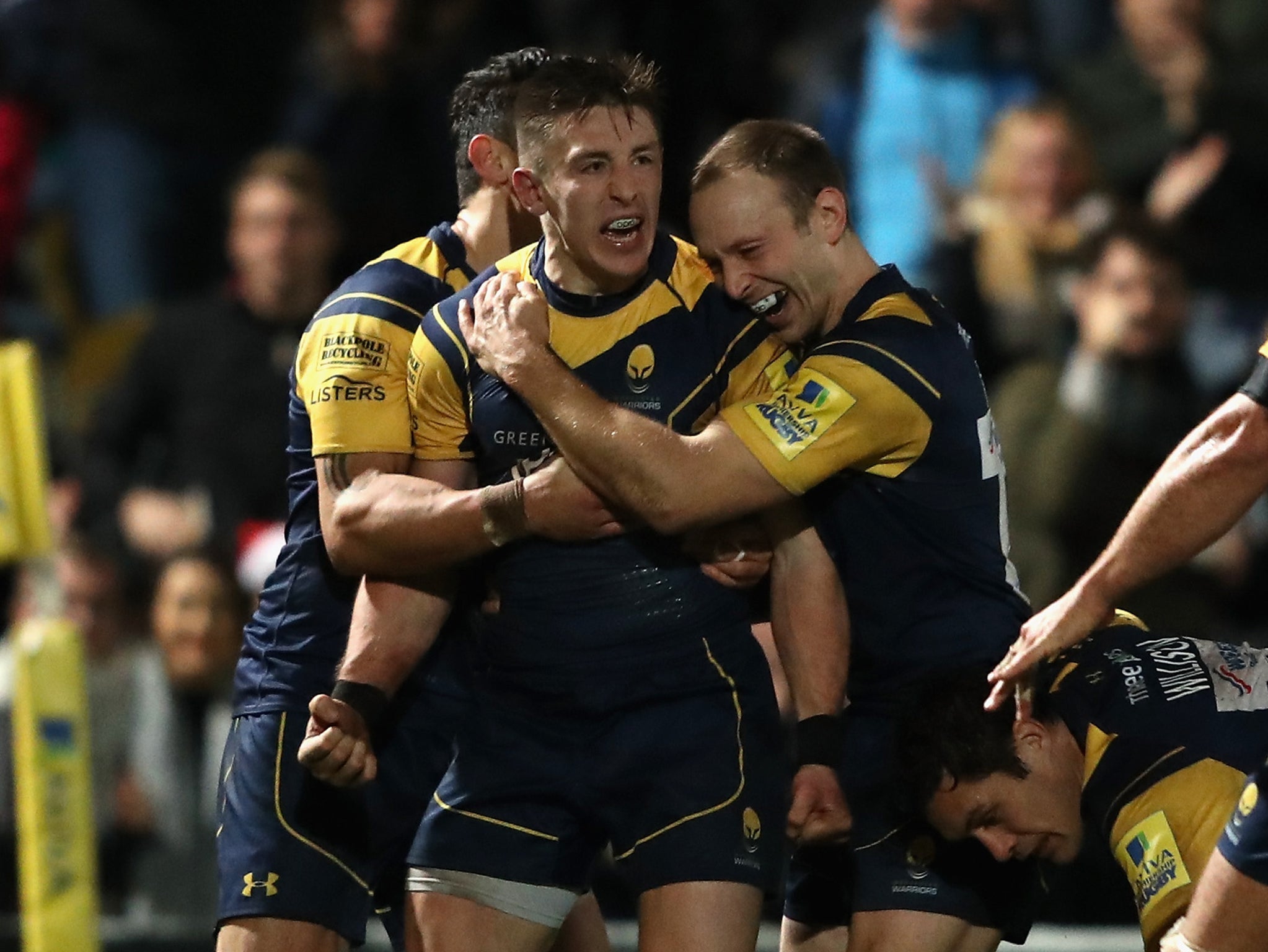 Josh Adams of Worcester Warriors celebrates with team mate Chris Pennell
