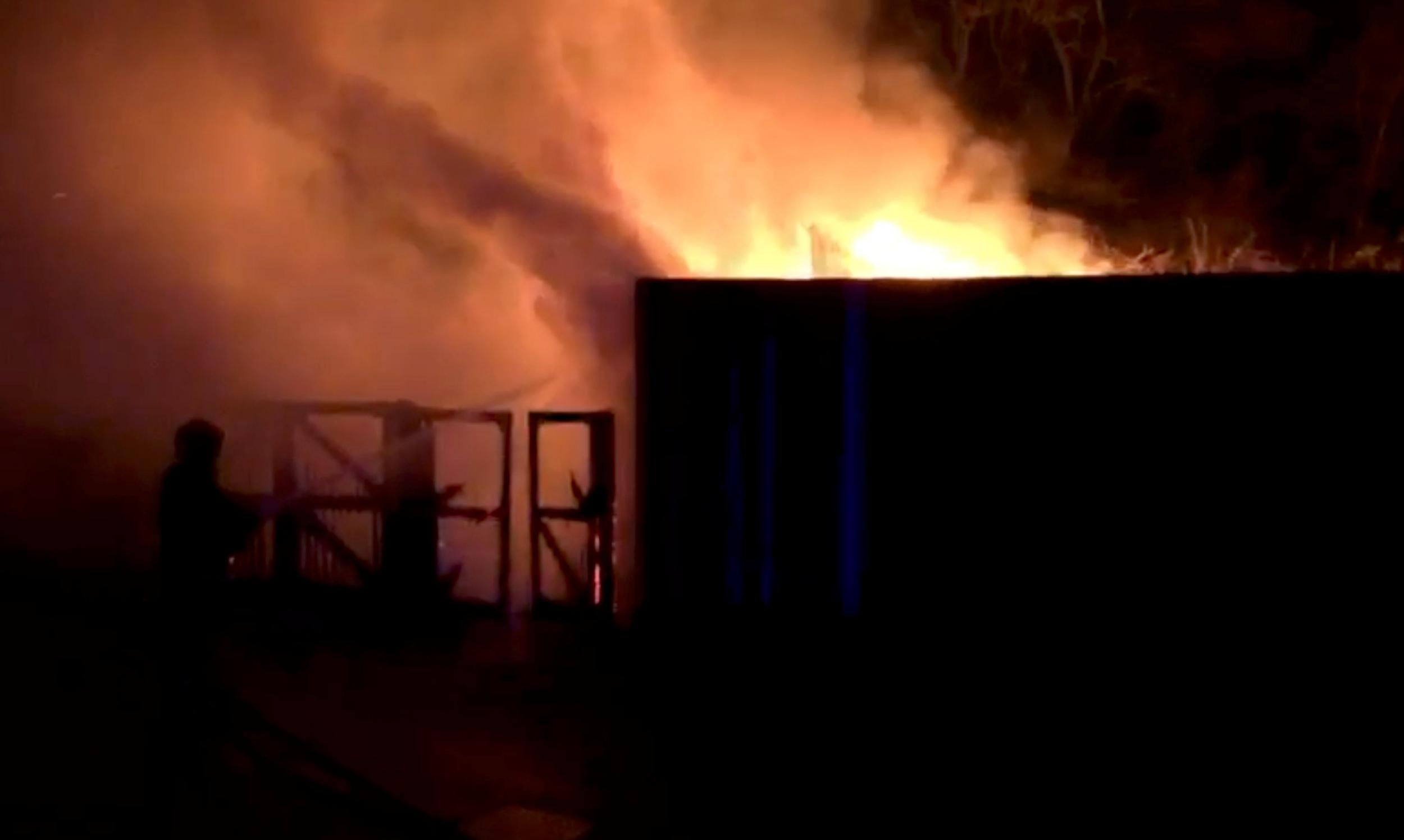 Firefighters tackle flames at London Zoo (REUTERS)