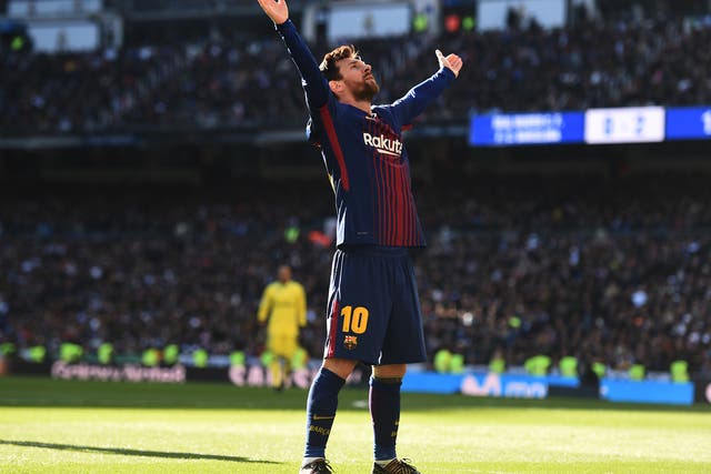 Lionel Messi celebrates after scoring Barcelona's decisive second goal