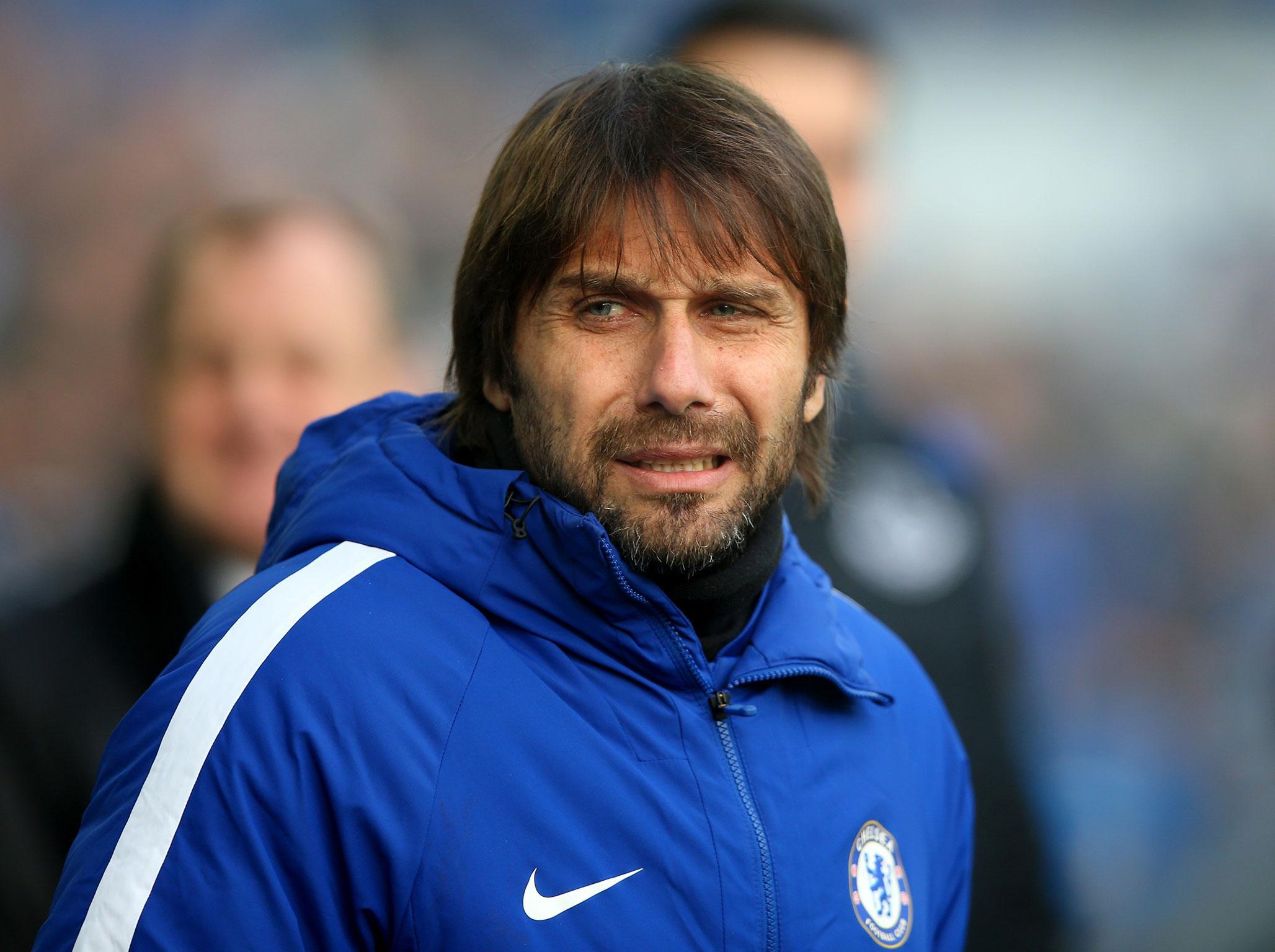 Antonio Conte is laying low beneath the flying barbs and criticism hoping the Chelsea hierarchy will deliver in January