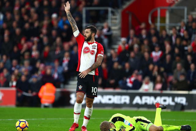 Charlie Austin could face FA action after an ugly clash with Huddersfield keeper Jonas Lossl