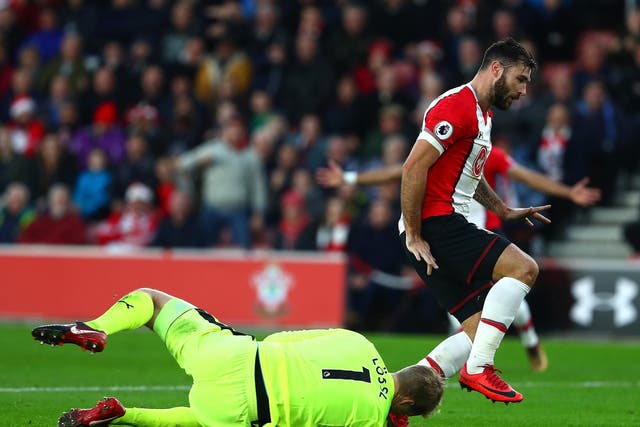 Charlie Austin faces a retrospective ban after being charged by the FA for violent conduct towards Jonas Lossl