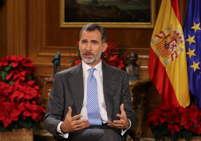 Spanish King Felipe VI delivers his Christmas Eve message at the Royal Palace in Madrid