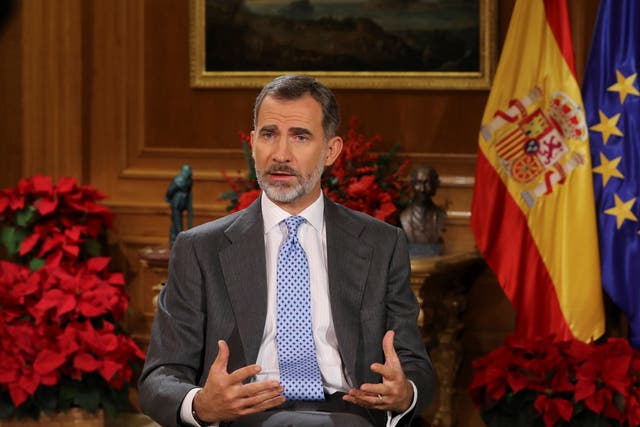 Spanish King Felipe VI delivers his Christmas Eve message at the Royal Palace in Madrid