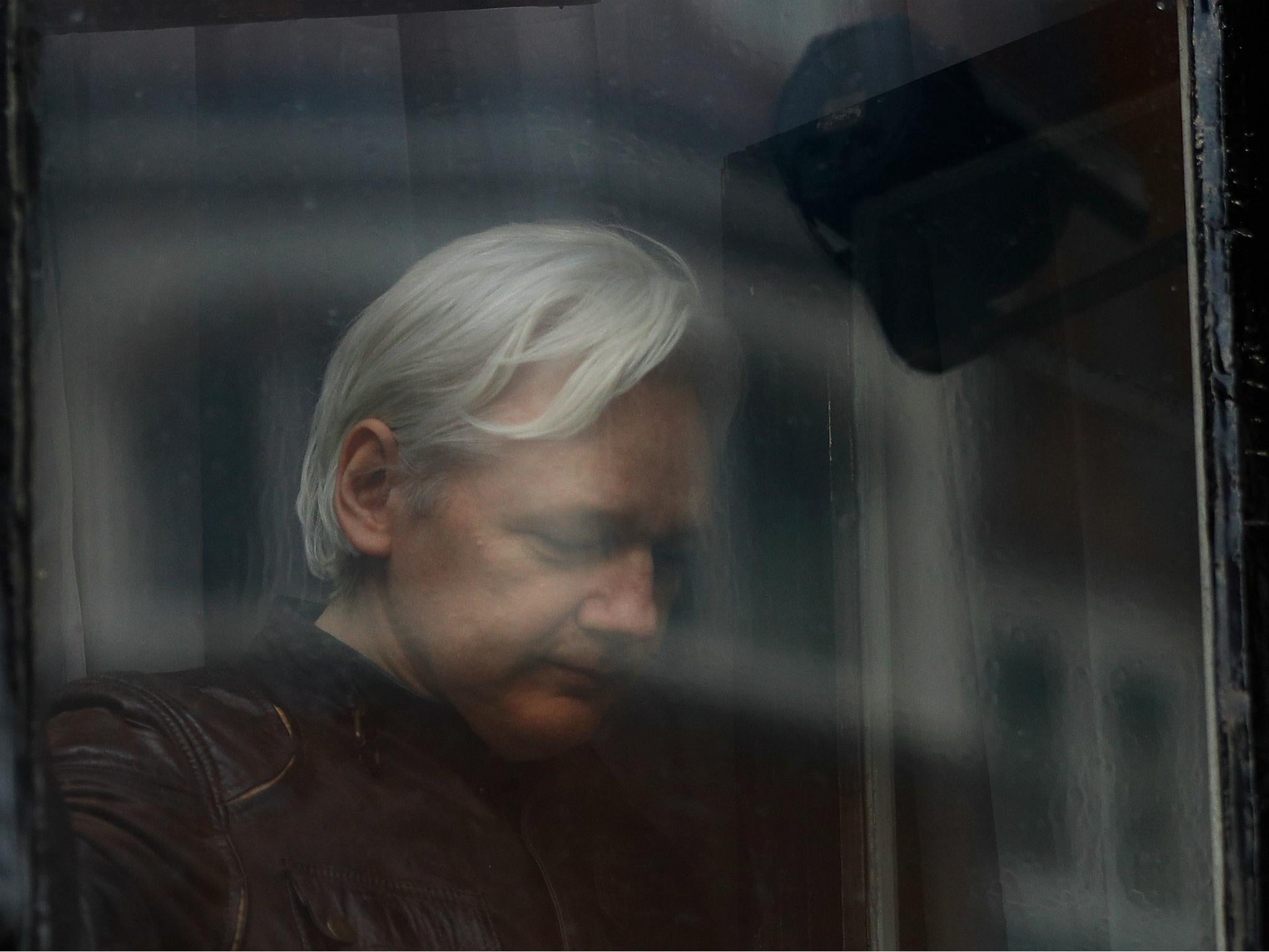 WikiLeaks founder Julian Assange is seen on the balcony of the Ecuadorian Embassy in London, Britain, May 19, 2017