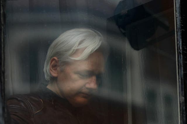 WikiLeaks founder Julian Assange is seen on the balcony of the Ecuadorian Embassy in London, Britain, May 19, 2017