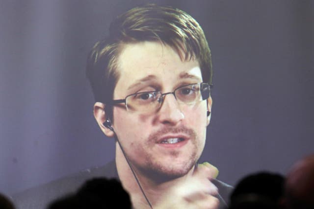 Edward Snowden speaks via video link during a conference at University of Buenos Aires Law School, Argentina, November 14, 2016