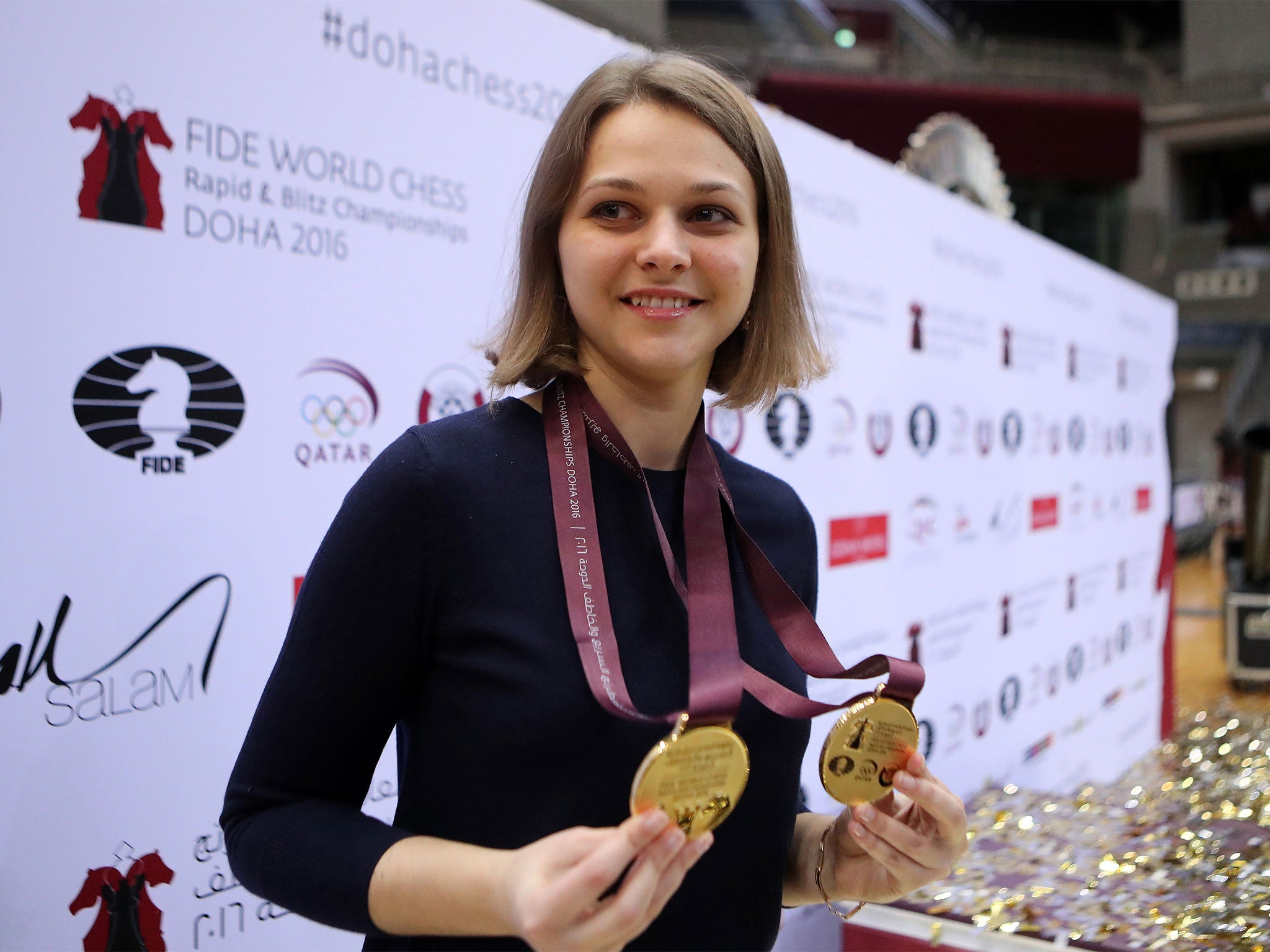 Muzychuk shows off her two titles - Rapid and Blitz World Championship medals