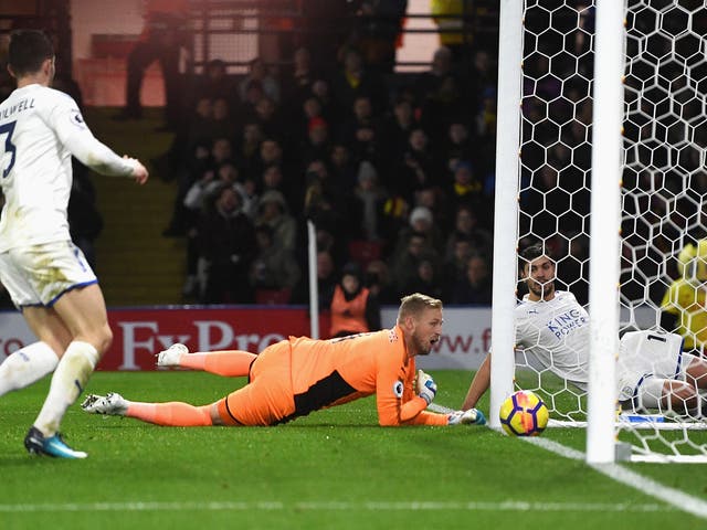 Kasper Schmeichel watches the ball cross the line for Watford's second goal