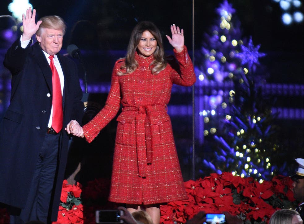 President Donald Trump and the first lady Melania Trump attend the 95th annual National Christmas Tree Lighting held by the National Park Service at the White House Ellipse.