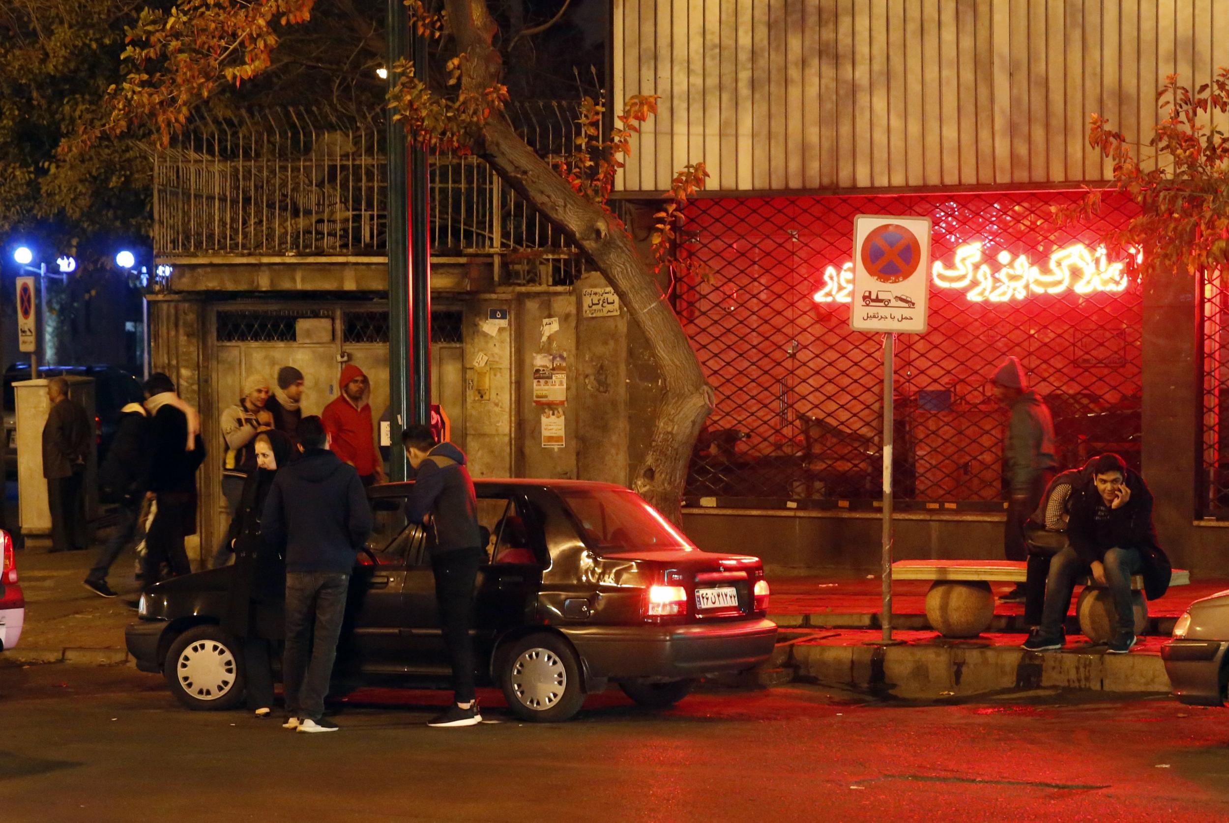 Iranians take to the streets after the initial 5.2 earthquake on 20 December