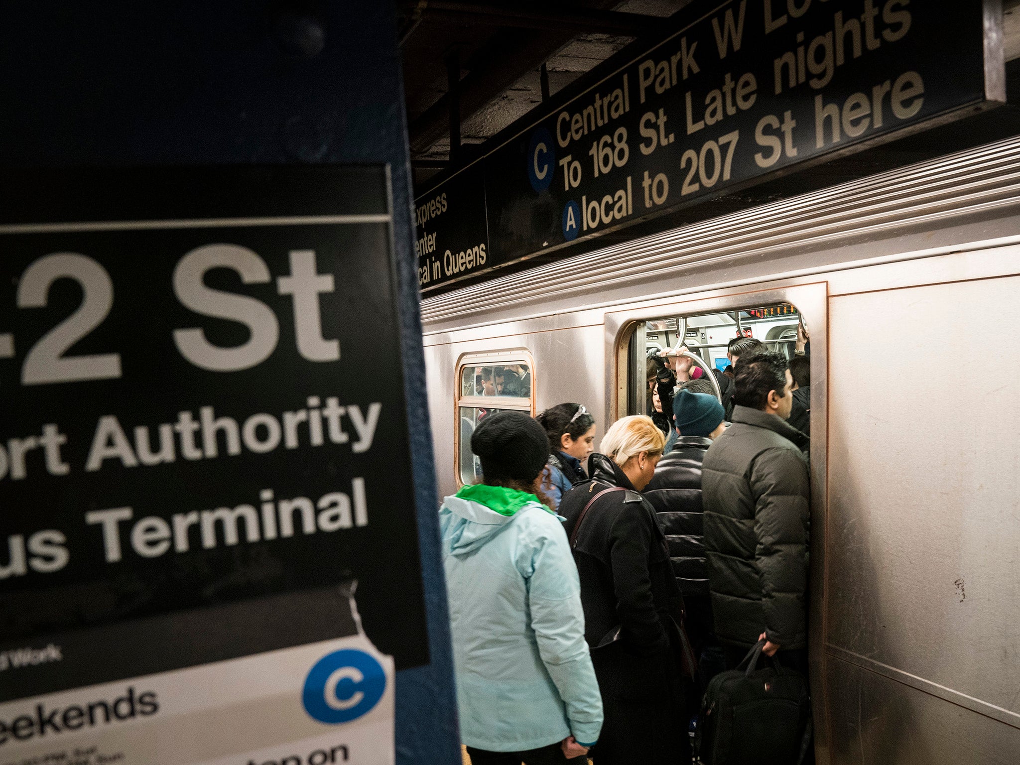 A man caught fire after falling on to tracks at 42nd St station