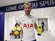Kane admits he still has a way to go to match Messi and Ronaldo