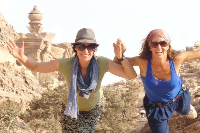 Sandra Jelly (left) teaches yoga classes in the desert around Petra