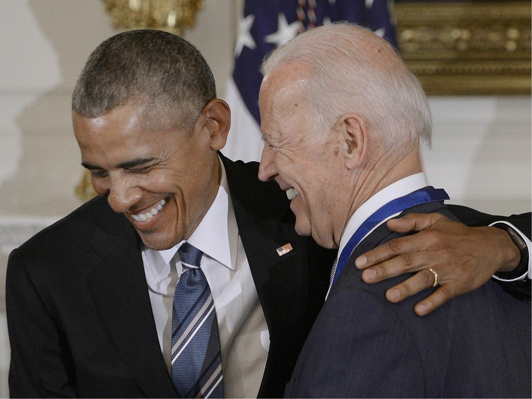 Former US President Barack Obama presents the Medal of Freedom to former Vice President Joe Biden on 12 January 2017.