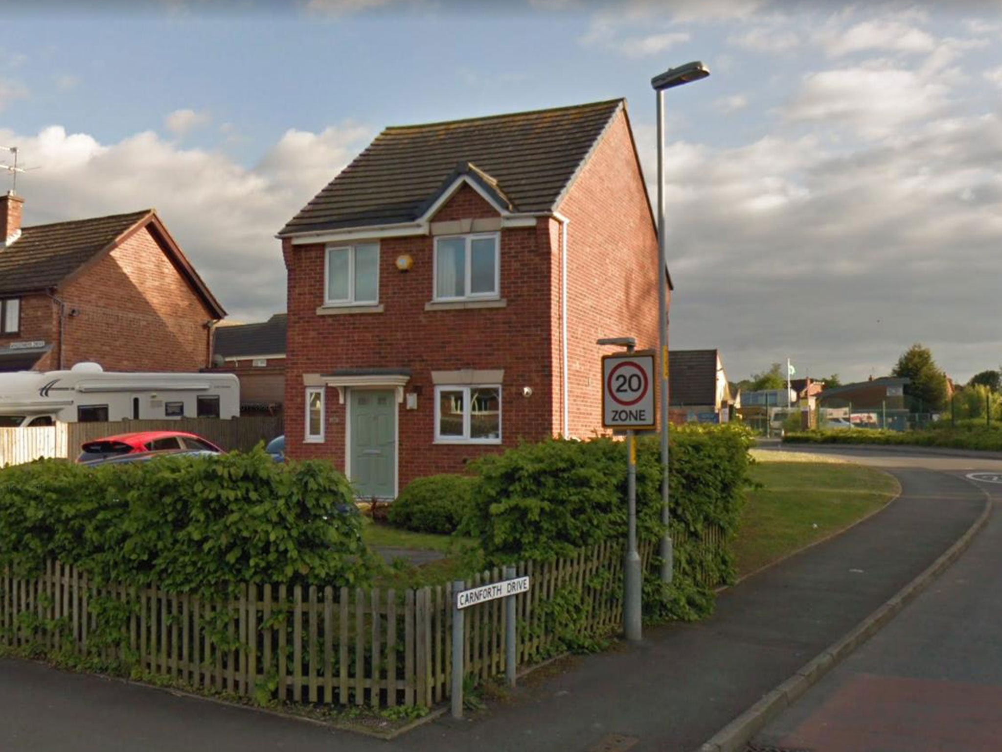 The woman was found dead in Carnforth Drive, Worcester