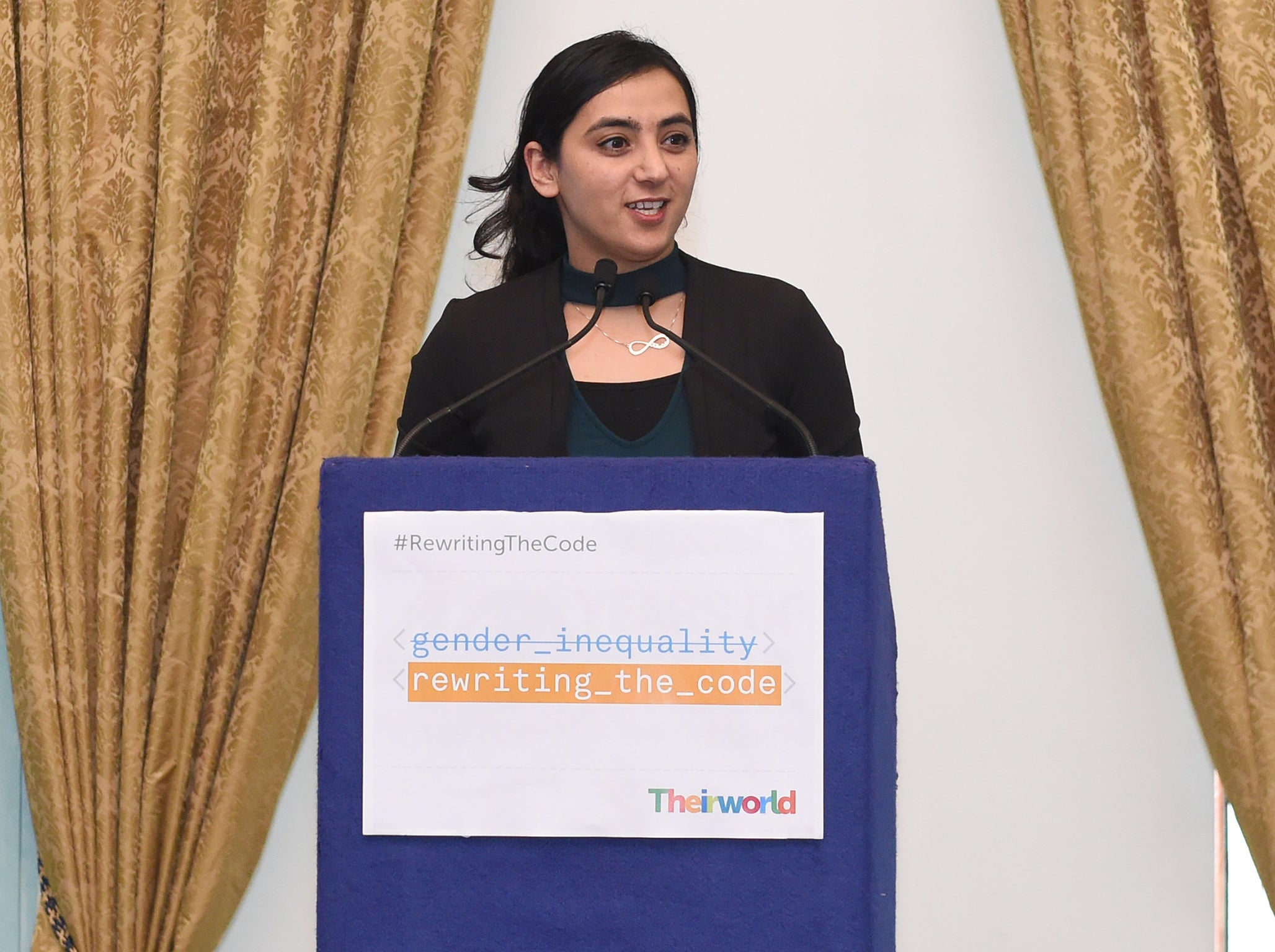 Popal addressing a conference in London
