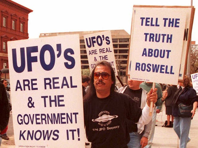 <p>Protestors demand to know about the crash at Roswell in 1947, which they believe was a UFO</p>