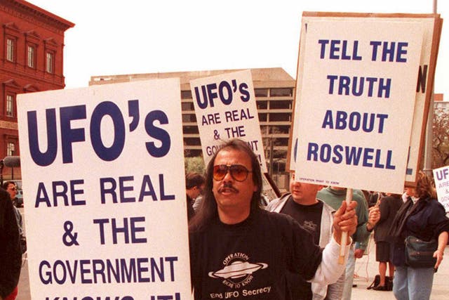 <p>Protestors demand to know about the crash at Roswell in 1947, which they believe was a UFO</p>