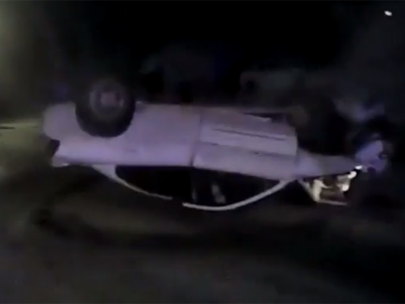 Officers Nicholas Schlei and Nicholas Reid rescued the two teenagers from the burning vehicle