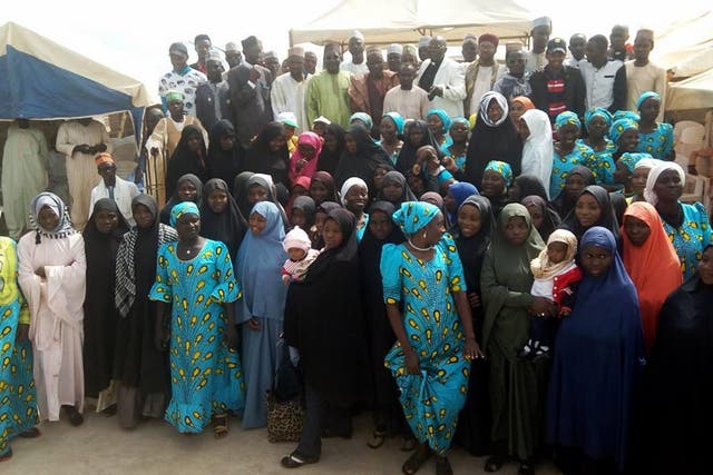 Members of the IMN pose with the congregation at the Evangelical Church Winning All (ECWA) in Kaduna