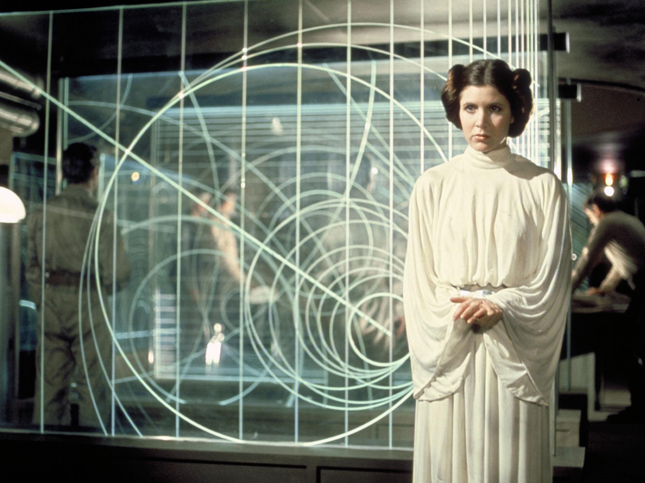 Carrie Fisher’s Leia was also revived with CGI, above in one the original films and below CGI