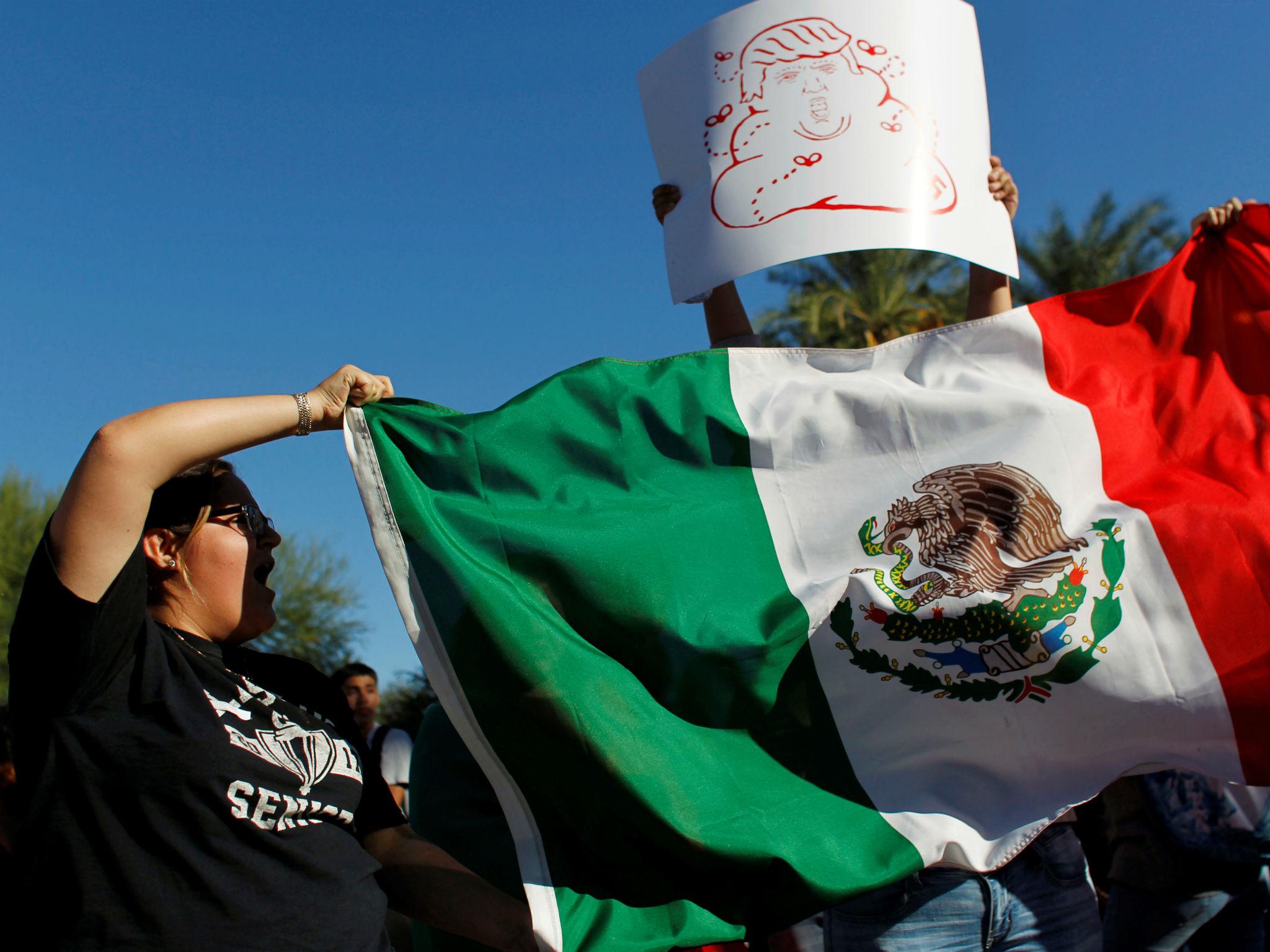 High school students gather in front of the Arizona Capitol in Phoenix to protest the election of Donald Trump