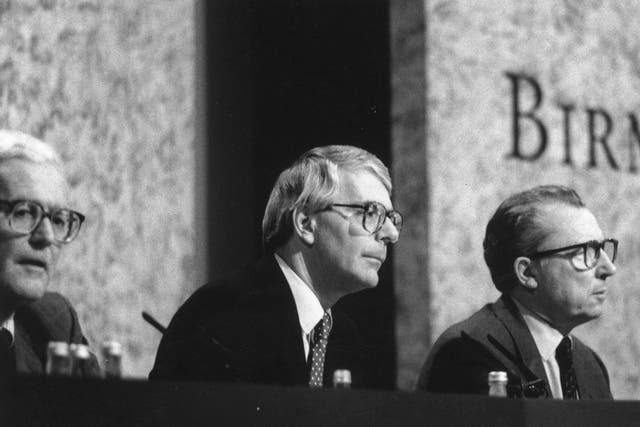 <p>Foreign secretary Douglas Hurd, left, and prime minister John Major, centre, with Jacques Delors at the EC summit in Birmingham, in October 1992</p>