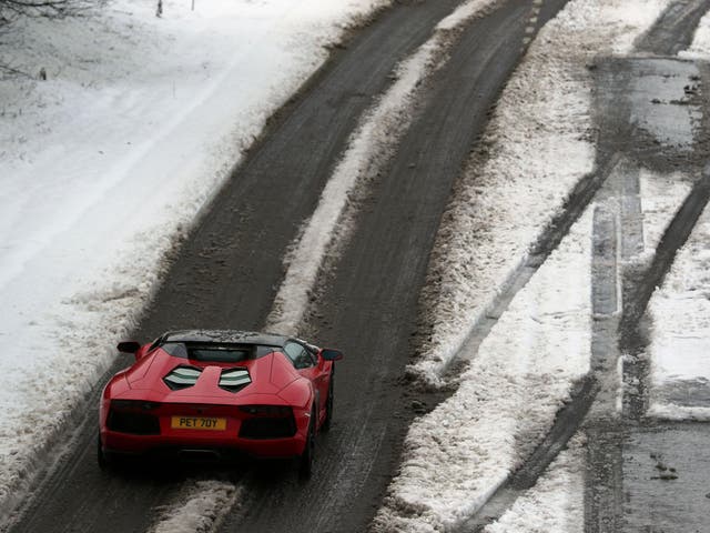 A super car drives along the A14 in Northampton earlier this week after wintry weather swept across the country